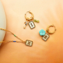 Maak een unieke collectie met stainless steel schelp bedels met letters