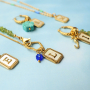 Maak een unieke collectie met stainless steel schelp bedels met letters