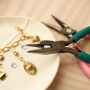 Cre&euml;er vrolijke kettingen en armbanden met stainless steel hartjes bedels