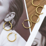 Tips voor het dragen van statement stainless steel oorbellen