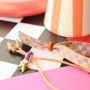 Cre&euml;er kleurrijke armbanden met bead stoppers