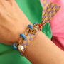 Cre&euml;er kleurrijke armbanden met bead stoppers