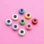 Cre&euml;er kleurrijke armbanden met bead stoppers