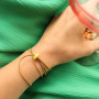 Cre&euml;er kleurrijke armbanden met bead stoppers