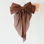 Mix & match jouw collectie met scrunchies & haarspelden met strik