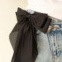 Mix & match jouw collectie met scrunchies & haarspelden met strik