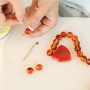 Mix & match: maak herfstige kettingen met acryl kralen