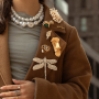 Bangles & Broches: d&eacute; statement items van dit seizoen 